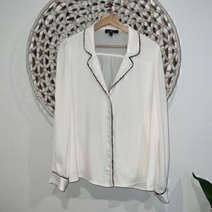 Lulu’s cream with Animal print long sleeve button down blouse size large